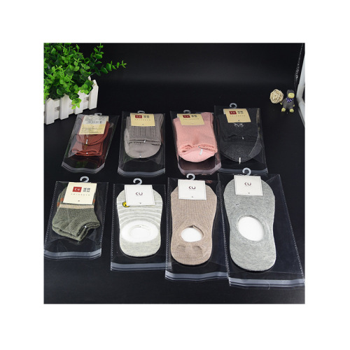 OPP self-adhesive bag sock packaging bag self-adhesive plastic bag transparent bag wholesale semi-circle hanging hole plastic bag
