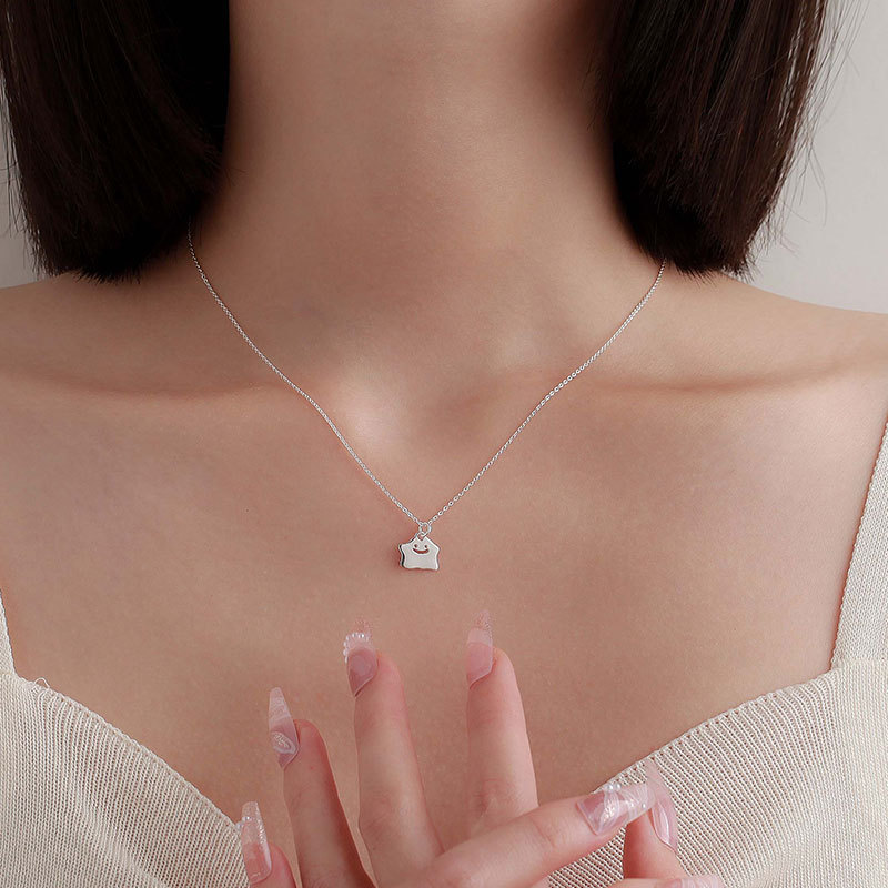 S999 sterling silver sweet and cool little monster smiley face necklace for women Japanese and Korean foot silver niche design sweet star baby clavicle chain