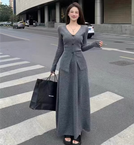 Lazy style solid color temperament horn button sweater women's autumn and winter elastic high waist loose long skirt knitted two-piece set