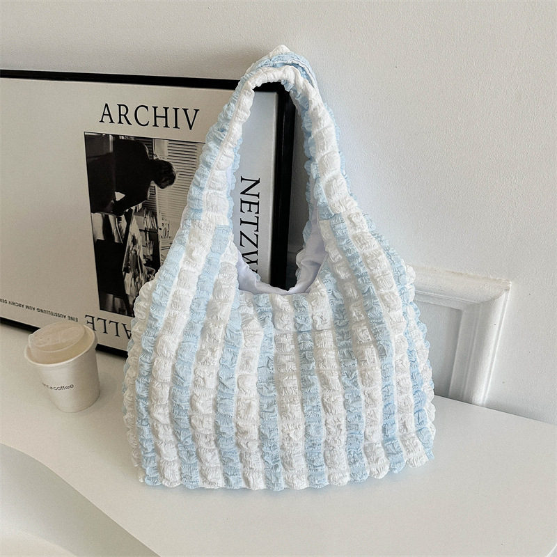 Single shoulder armpit bag 2024 fashion simple temperament commuter pleated bag women's large capacity portable bucket bag trendy