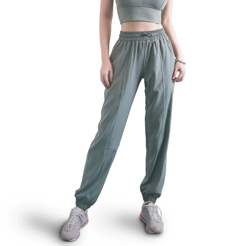 Slimming sports pants for women, loose leg-tie running fitness pants, quick-drying high-waisted large pocket yoga pants