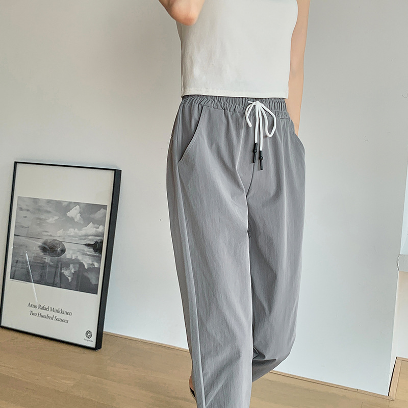 2024 summer new style quick-drying casual pants with pockets for women, breathable eight-quarter pants, simple drawstring sports carrot pants