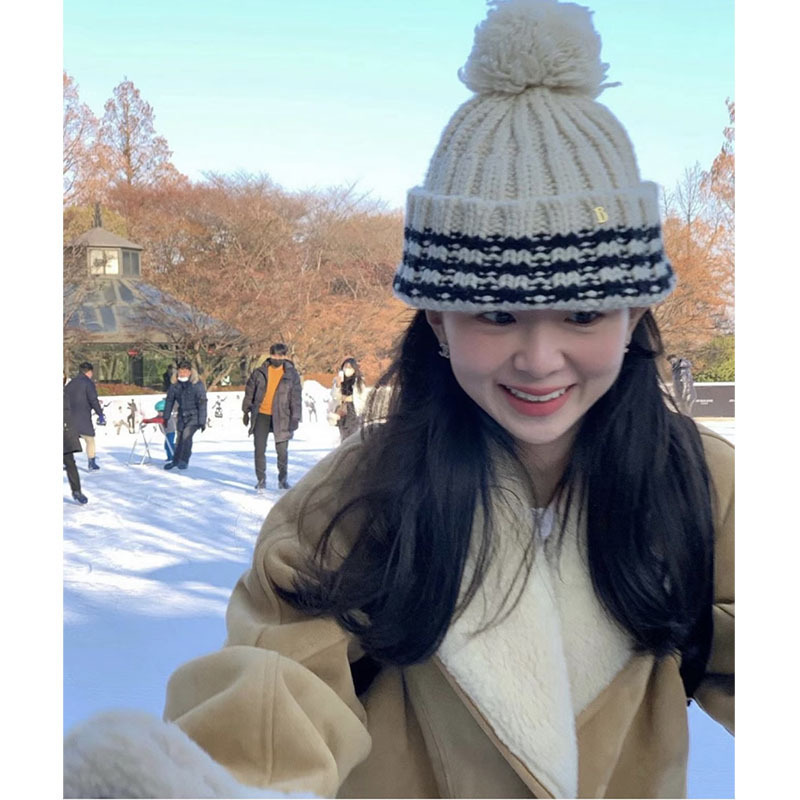 New ins blogger style niche wool ball ball black and white striped knitted hat autumn and winter ear protection warm pointed hat for women