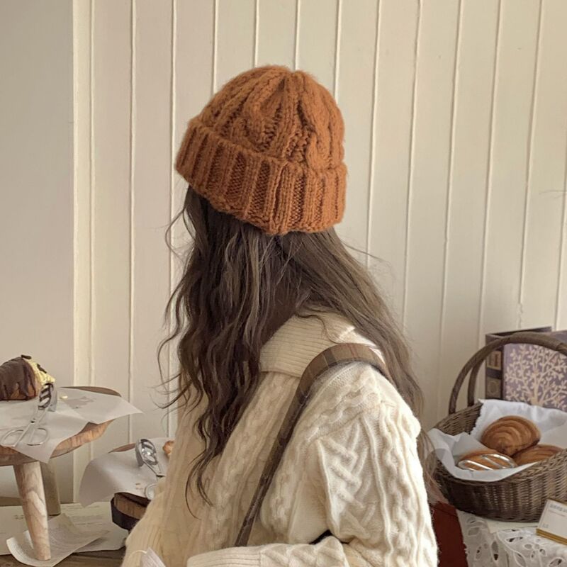 Korean style multi-color woolen hat suitable for round face women autumn and winter versatile twist knitted hat warm pile hat
