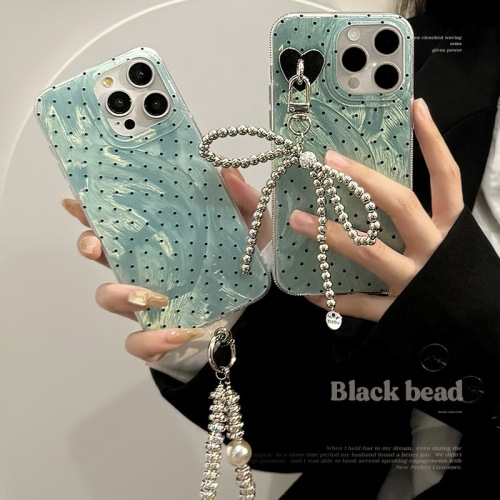 Mint green polka dot mobile phone case suitable for 15promax feather yarn iphone13 bow chain 16 apple 14 hard