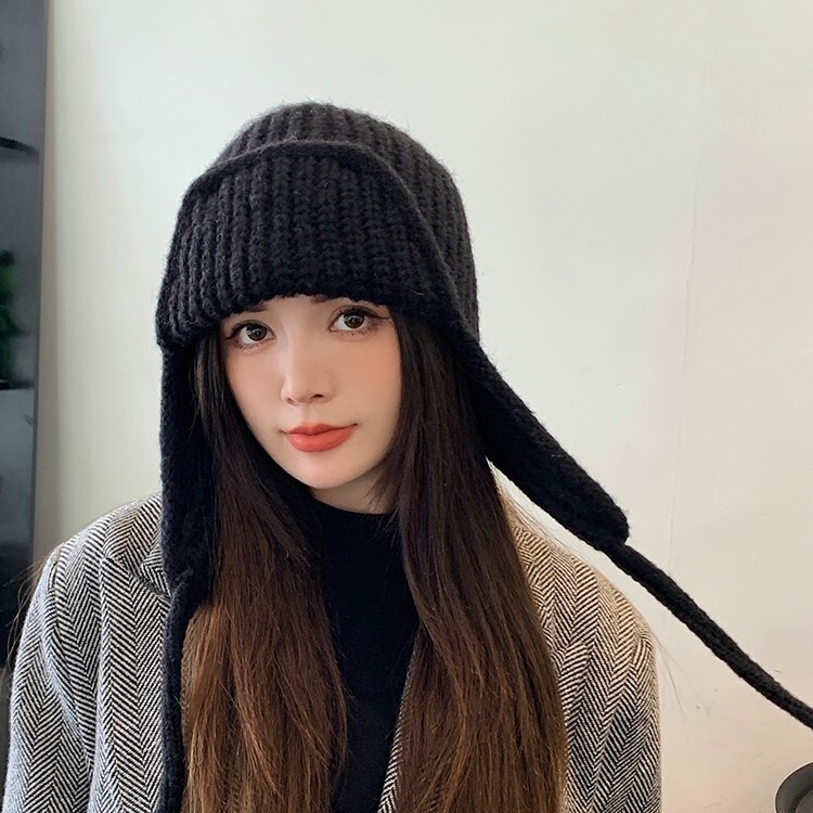 Solid color warm ear protection knitted hat for women autumn and winter strappy woolen hat Korean style fashion thickened flying thunder hat