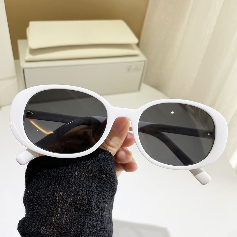 Small oval frame sunglasses for women, high-end vacation seaside anti-UV white frame polarized sunglasses personality