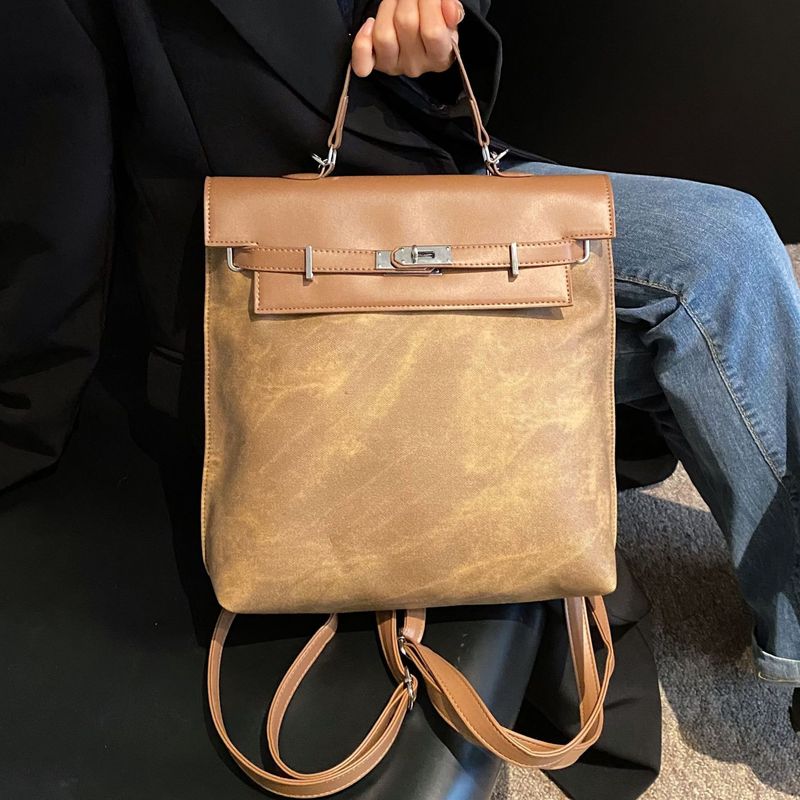 Hand-held commuter bag women's new trendy retro frosted backpack niche large-capacity hand-held Kelly bag
