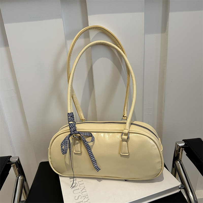 Internet celebrity fashion simple solid color ribbon handbag 2024 spring new versatile ins shoulder armpit bag Korean version