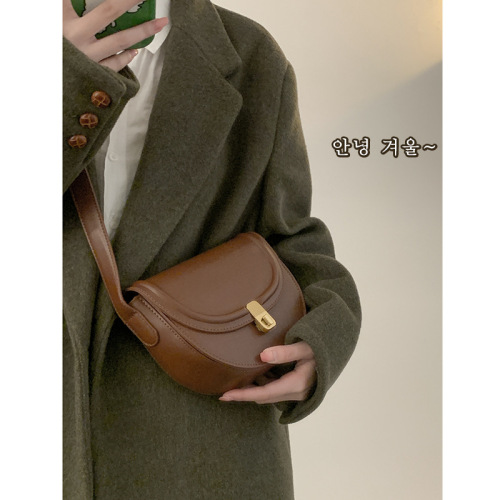 Retro niche texture small bag women's new simple saddle bag versatile shoulder crossbody bag