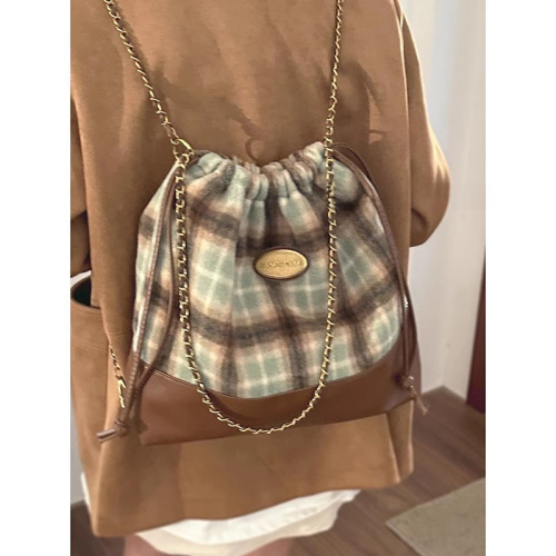 Guangzhou factory retro college style backpack women's autumn and winter trendy Korean woolen large-capacity bucket bag