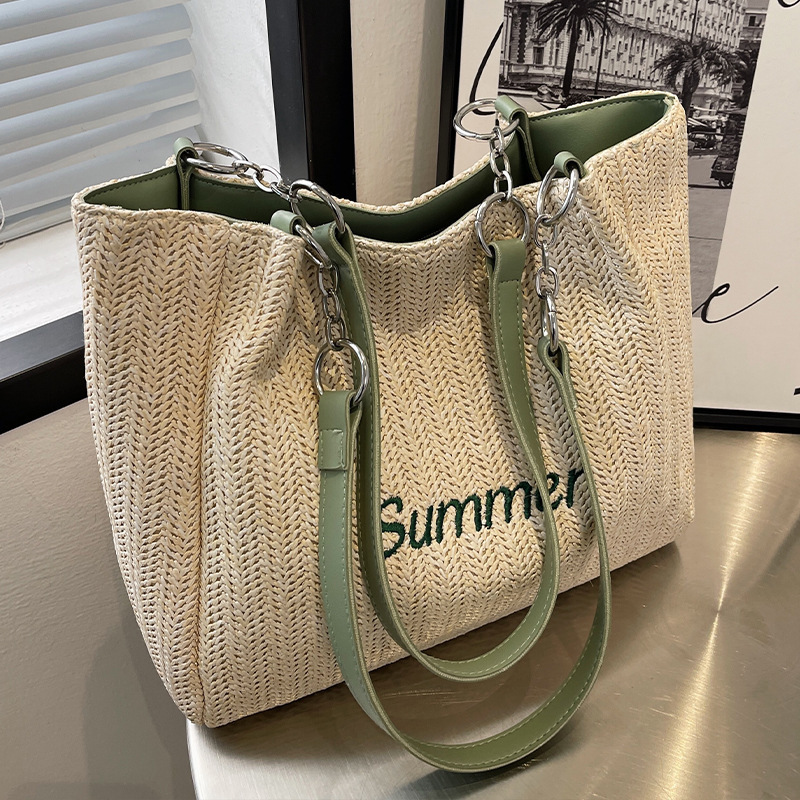 Straw large-capacity women's bag 2024 summer versatile niche woven bag western style commuting fashion shoulder tote bag