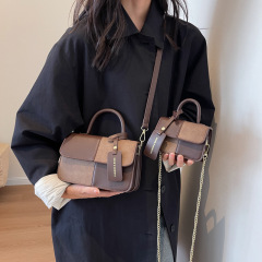Autumn and winter new frosted splicing mini hand-held parent-child hand-carrying cross-body accessories small shoulder bag wholesale