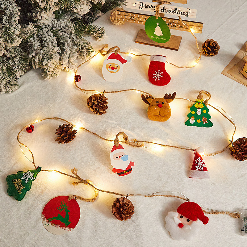 Christmas tree decoration small pendants holiday decoration shop scene layout pine cone glowing light ornaments
