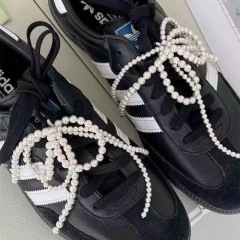 Korean version of the new pearl bow circle tassel shoe buckle hanging fashion small fragrant shoe accessories accessories