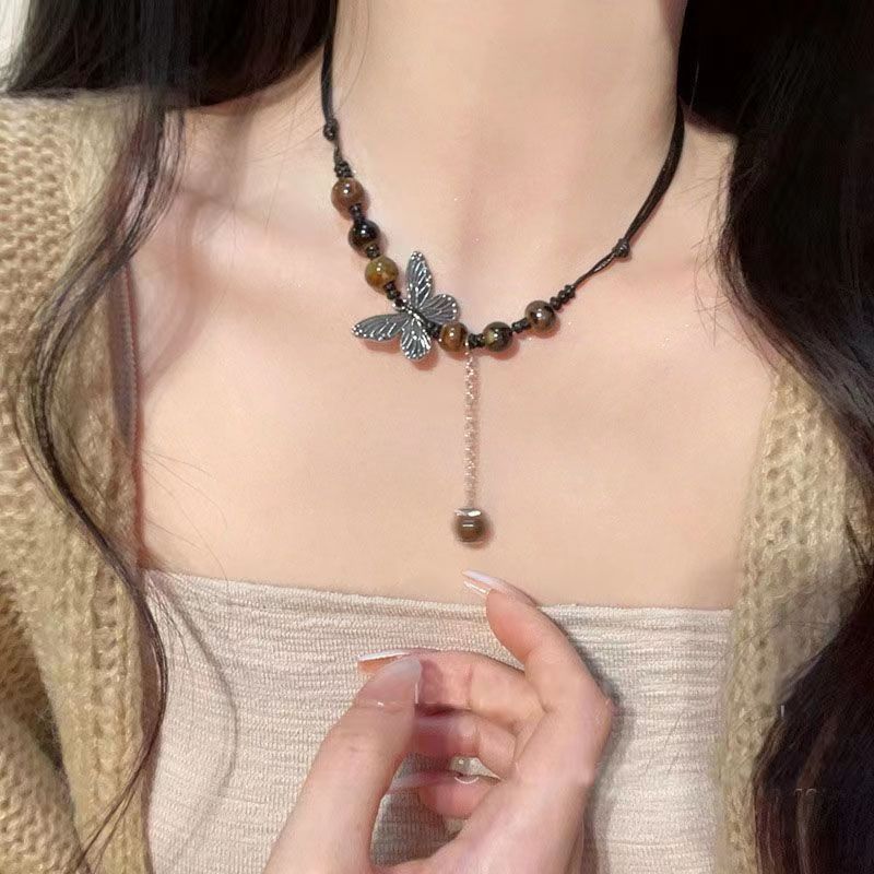 Chinese ethnic style butterfly necklace niche ancient style long sweater chain braided clavicle chain trend