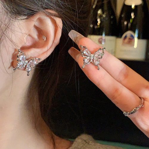 Exquisite zircon butterfly earrings for women S925 silver needles dancing hollow design earrings internet celebrity same style earrings