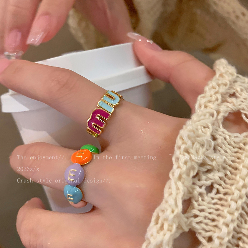Colorful dopamine m bean ring for women, niche design, high-end open ring, fashionable personalized letter index finger ring