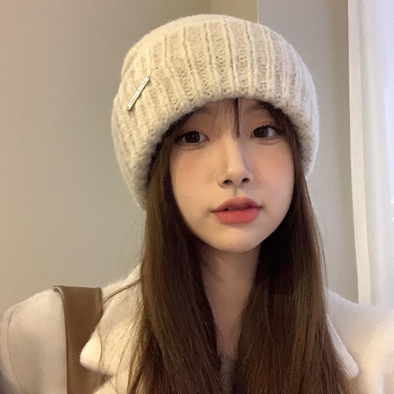 Woolen hat for women in autumn and winter, Korean version with metal label, mohair knitted cold hat for men, versatile loose, thickened and warm pile hat