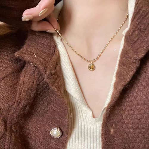 Korean high-end butterfly necklace women's niche light luxury versatile clavicle chain long popular imitation pearl sweater chain new