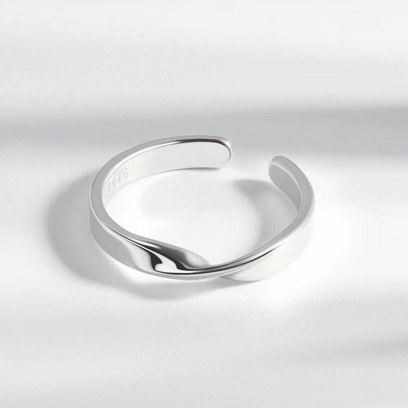 European and American cross-border irregular twist ring for women, simple and cold style halo open ring, wide version of Möbius ring