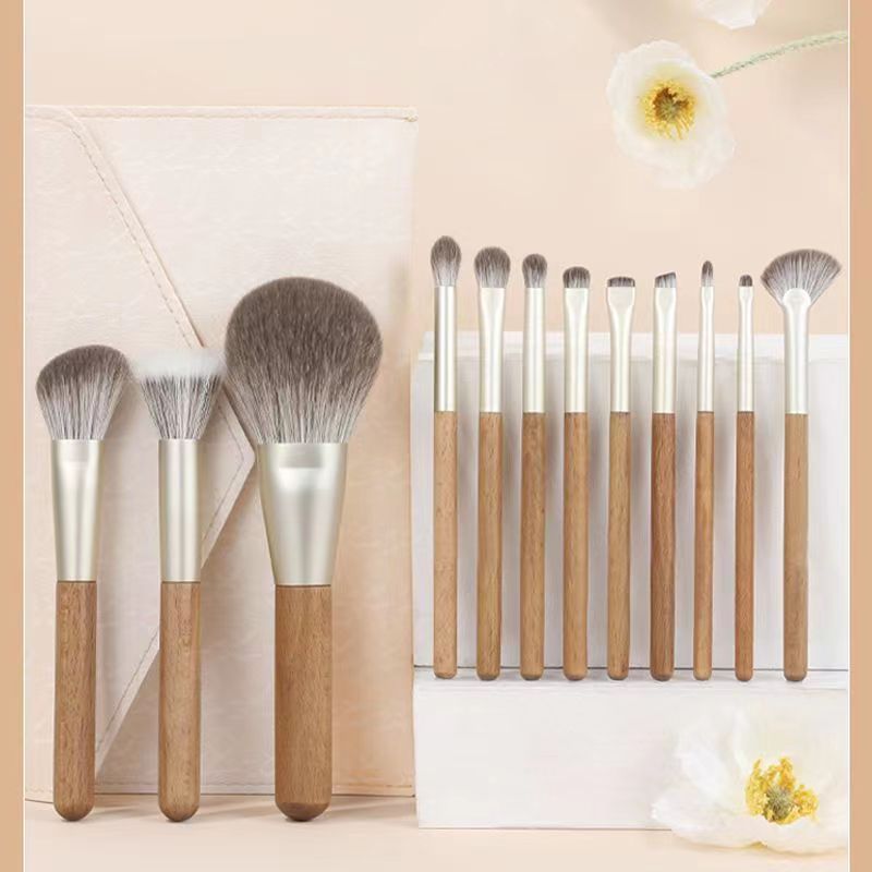 New 12-piece makeup brush set Cangzhou eyeliner brush solid wood beauty tools eye shadow brush loose powder blush log color