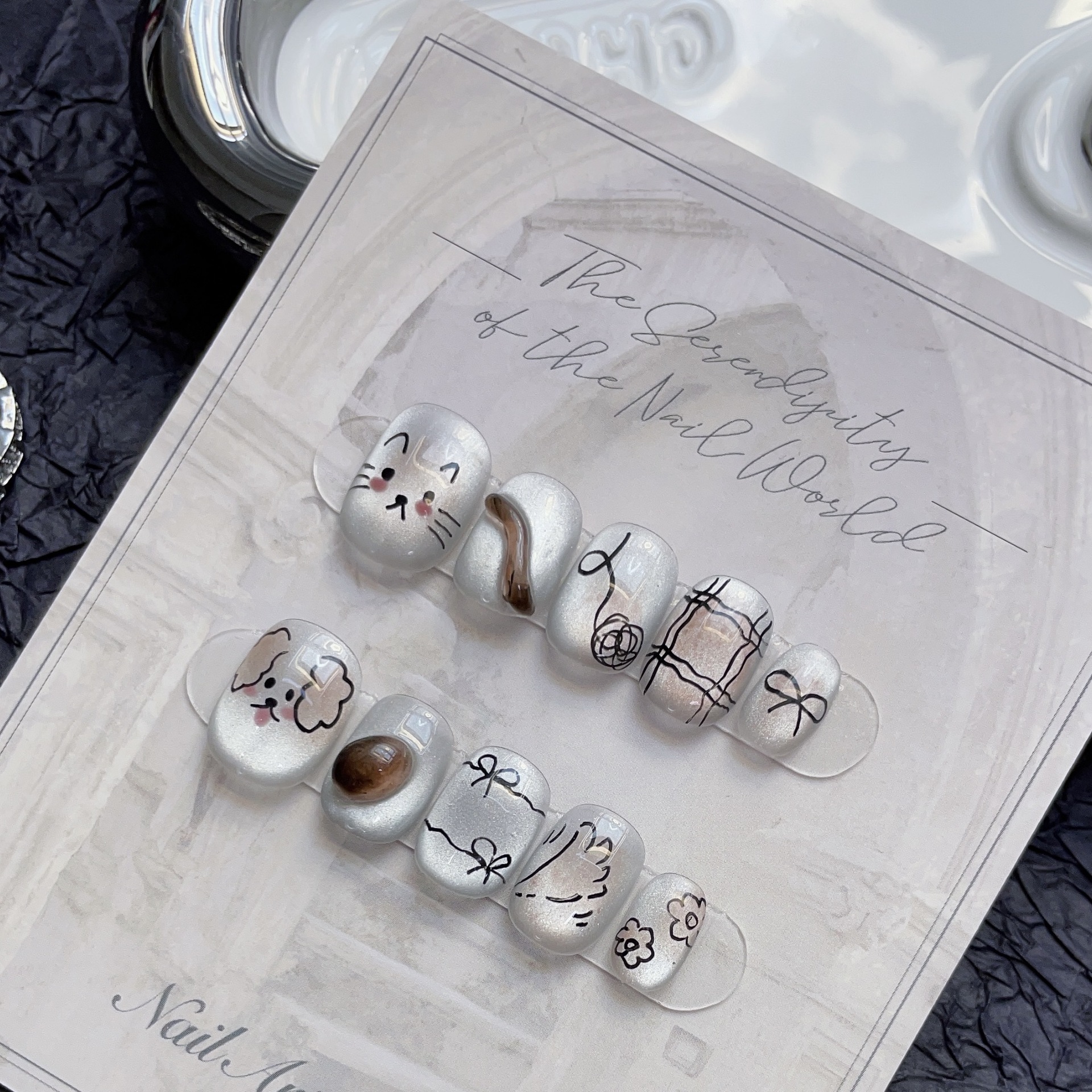 Purely handmade new autumn and winter wearable nails niche ins style white ceramic white cat eyes happy puppy graffiti manicure