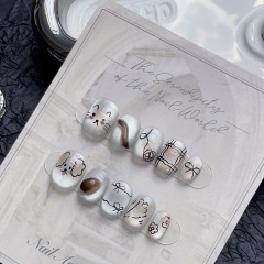 Purely handmade new autumn and winter wearable nails niche ins style white ceramic white cat eyes happy puppy graffiti manicure