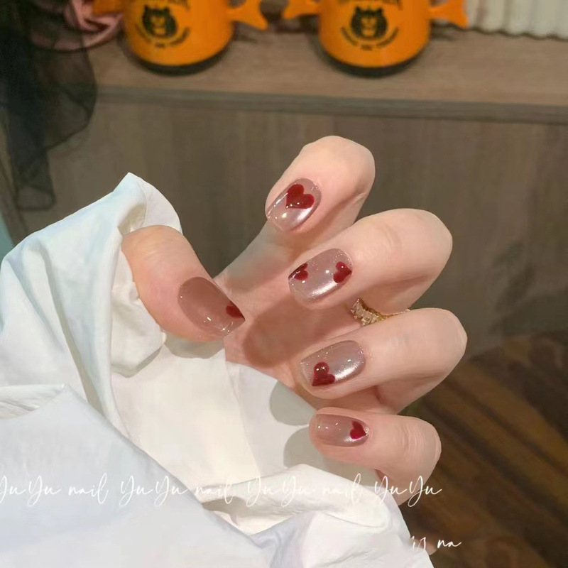 [New Year's Manicure] Actual shot of hand-made nail polish, hand-made high-end ins white nude cat-eye love heart short