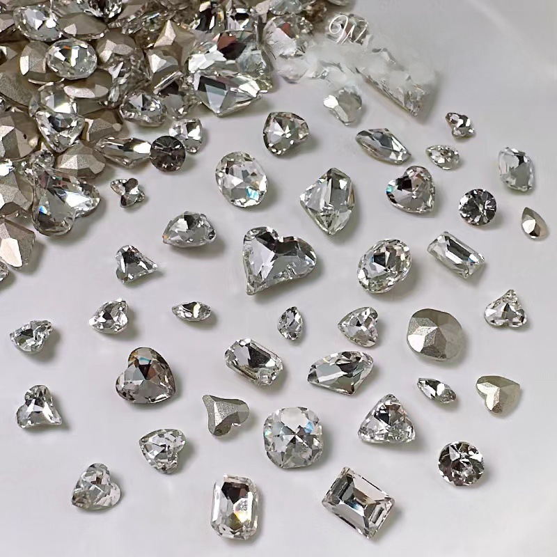 Wholesale nail art accessories transparent pointed bottom diamond super flash big crooked heart ax water drop fat square butterfly white diamond nail accessories