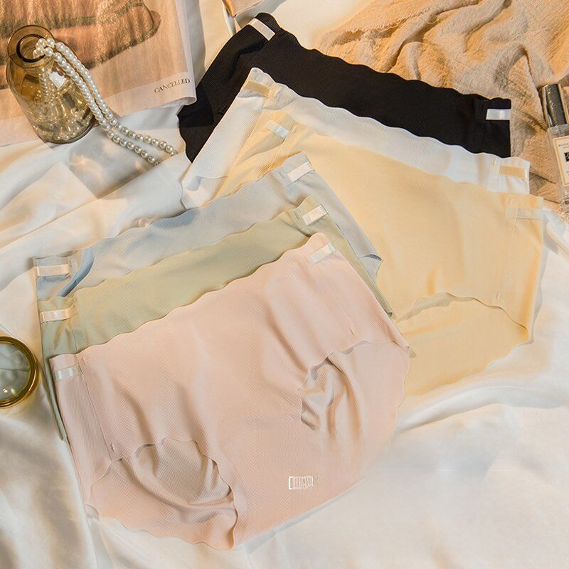 Internet celebrity live broadcast popular ice silk seamless underwear mid-waist thin sweet girl peach butt quick-drying hip lifting briefs