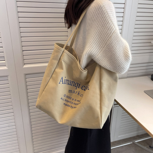 Canvas bag women's large capacity 2024 new versatile shoulder bag cloth bag college student class bag commuter tote bag