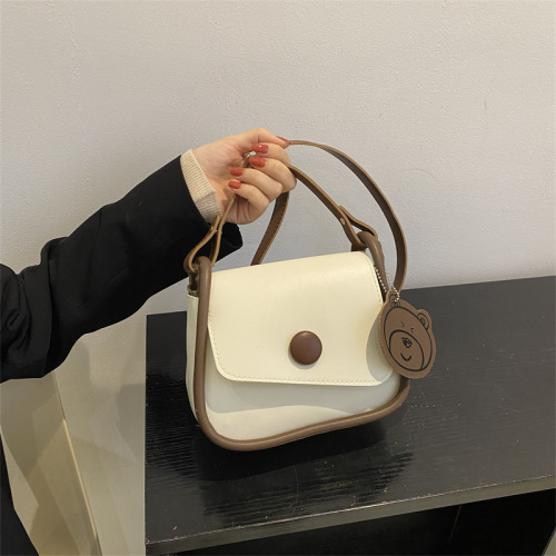 Popular solid color retro bag new trendy fashionable one-shoulder simple crossbody casual commuter saddle bag