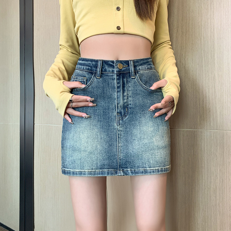 Sexy hot girl style hip-hugging skirt, ultra-short retro A-line denim skirt, high-waisted elastic anti-exposure lining, fashionable and slimming