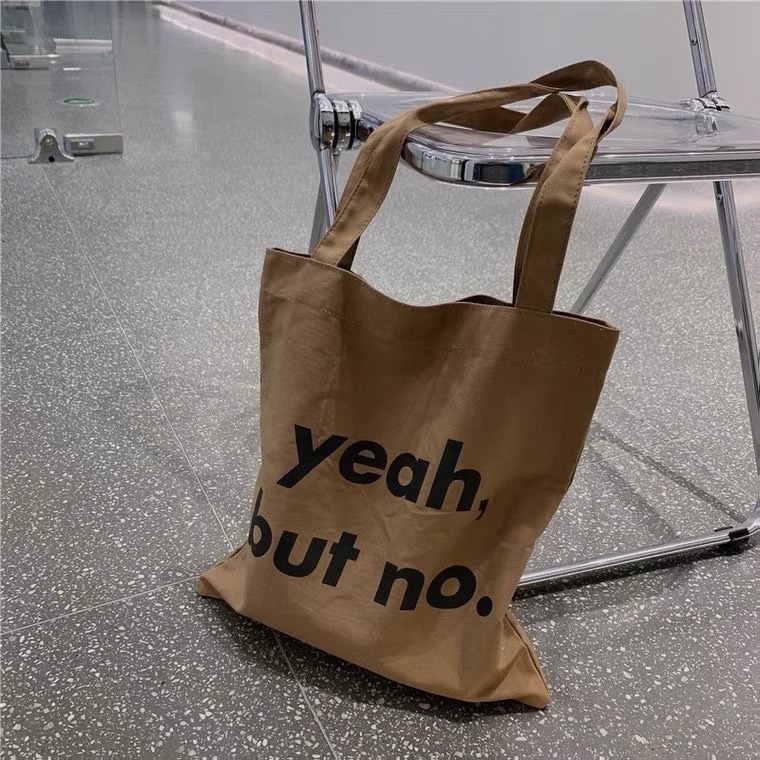 Cross-border supply simple letter portable canvas bag niche versatile tote bag student class bag commuter shoulder bag