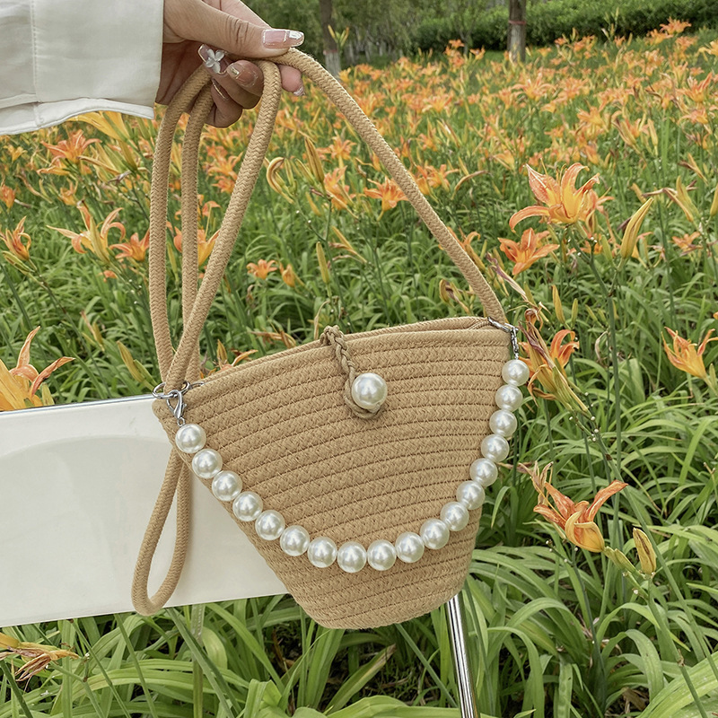 New forest style spring and summer woven crossbody bucket bag fresh and sweet seaside vacation pearl shell women's bag