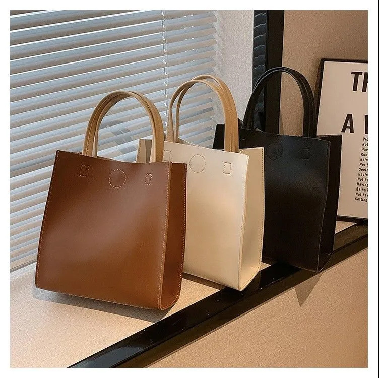 Temperament popular women's bag vertical style new style bag Korean version versatile commuting stain-resistant large capacity portable tote bag