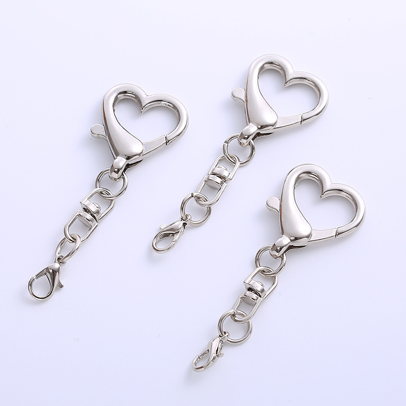 Factory direct sales wholesale special-shaped peach heart dog buckle jewelry accessories diy pendant metal love-shaped keychain in stock