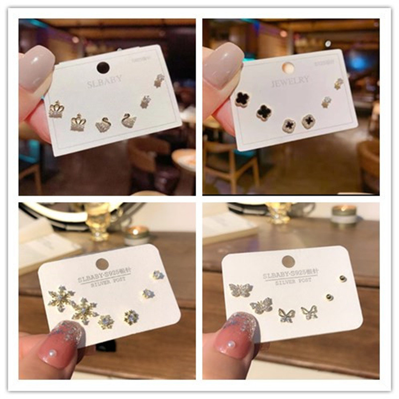 S925 Silver Needle Set Asymmetrical Korean Simple Swan Snowflake Temperament Female Earrings Student Cat's Eye Stone Earrings Wholesale