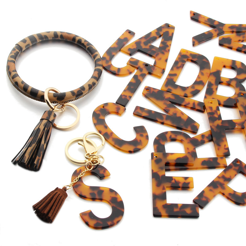 Cross-border new leopard print bracelet PU leather bracelet bag pendant creative gift acrylic letter keychain