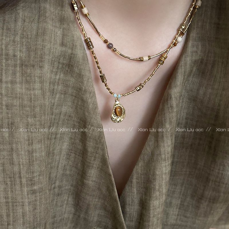Imitation tiger eye stone pendant beaded necklace personality sweet and cool clavicle chain women's high-end retro American neck necklace accessories
