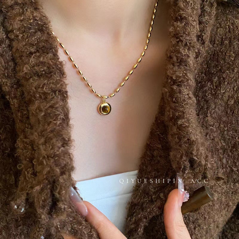 High-end millet tiger eye stone necklace women's autumn and winter retro sweater chain high-end atmospheric long pendant clavicle chain