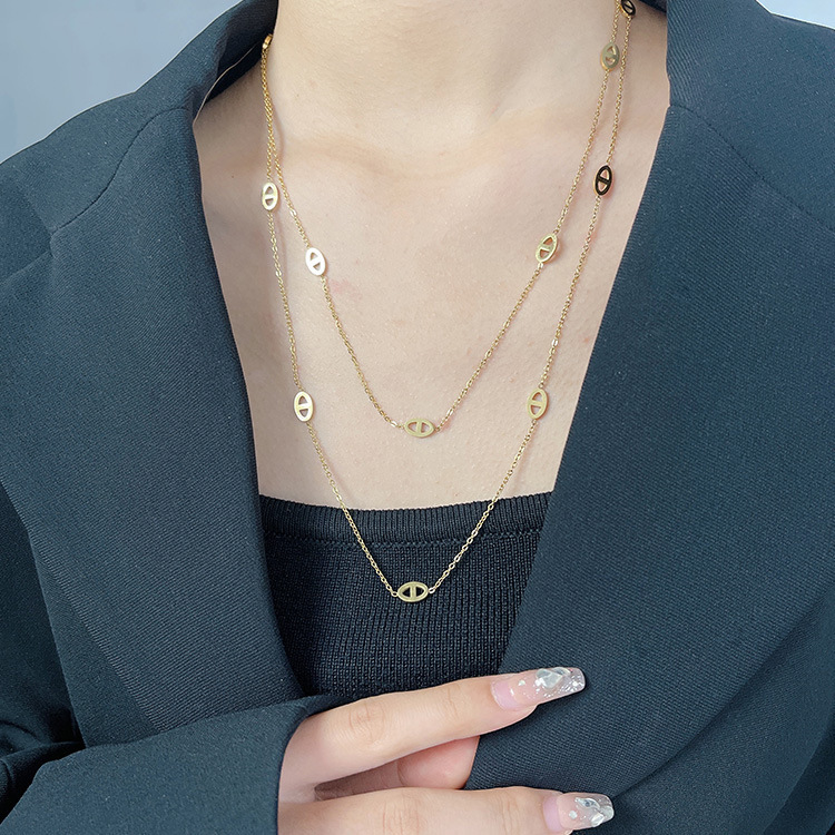 Light luxury, fashionable long pig nose necklace, personalized European and American niche design, exquisite double layer stacking necklace