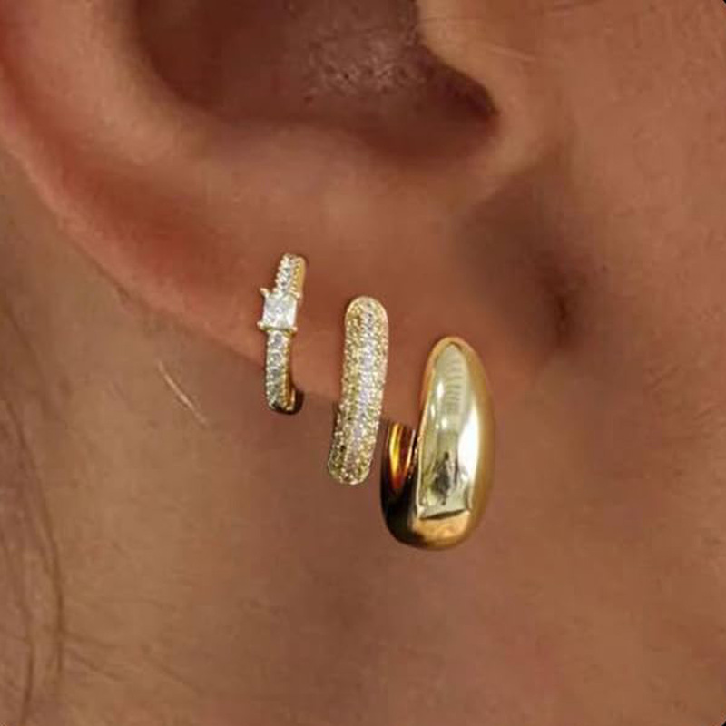 Amazon's new cross-border copper-plated 14K gold single-ear set cubic zirconia earrings, fashionable and simple women's jewelry