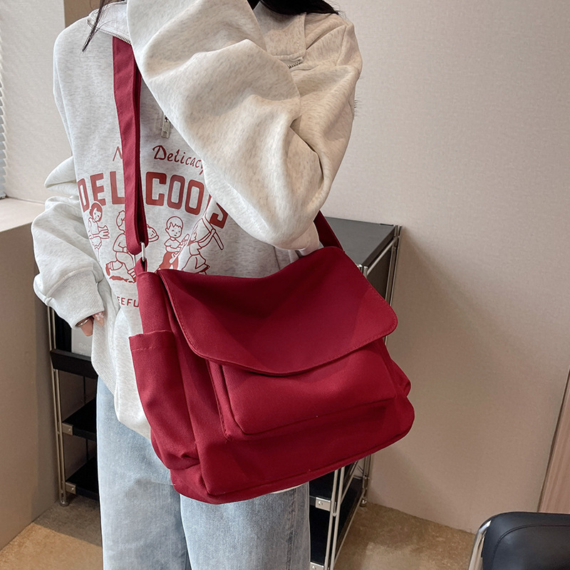 ins Korean style simple solid color versatile Japanese crossbody bag shoulder canvas bag male and female student class messenger bag