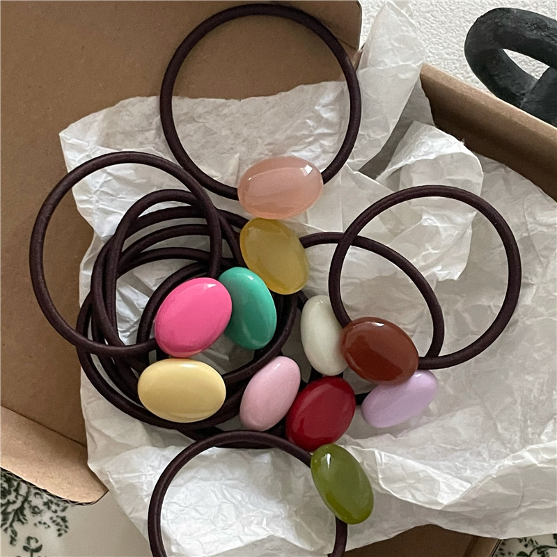 New style for early spring. Cream color cute oval pebble hair tie. Colorful beaded hair rope basic hair tie.