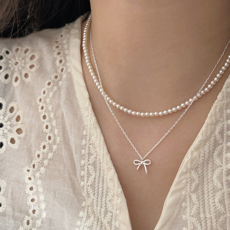Jiheng S925 sterling silver light luxury pearl bow double-layer stacked necklace for women Korean summer versatile clavicle chain