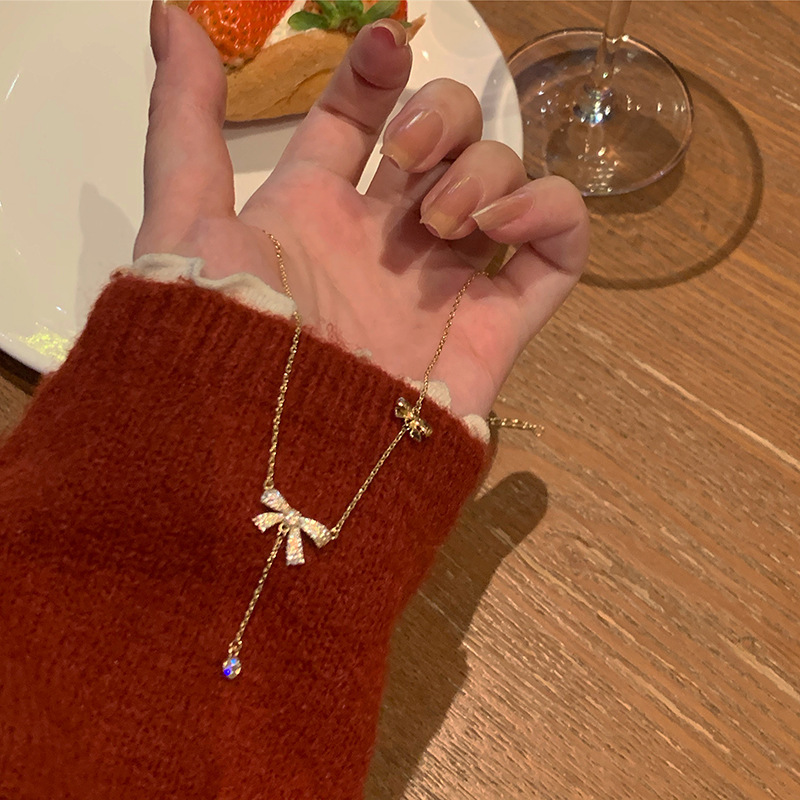 French bow tassel necklace for women retro zircon pendant light luxury ins niche design advanced clavicle chain