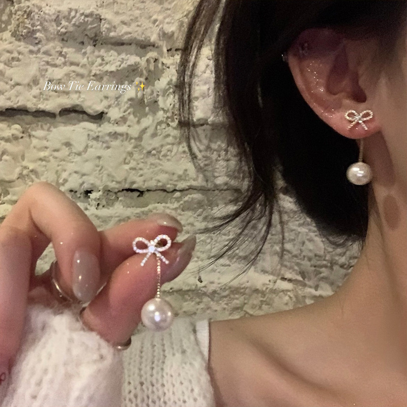 Light luxury niche high-end long tassel earrings for women, versatile temperament, micro-studded diamond bow earrings, stud earrings