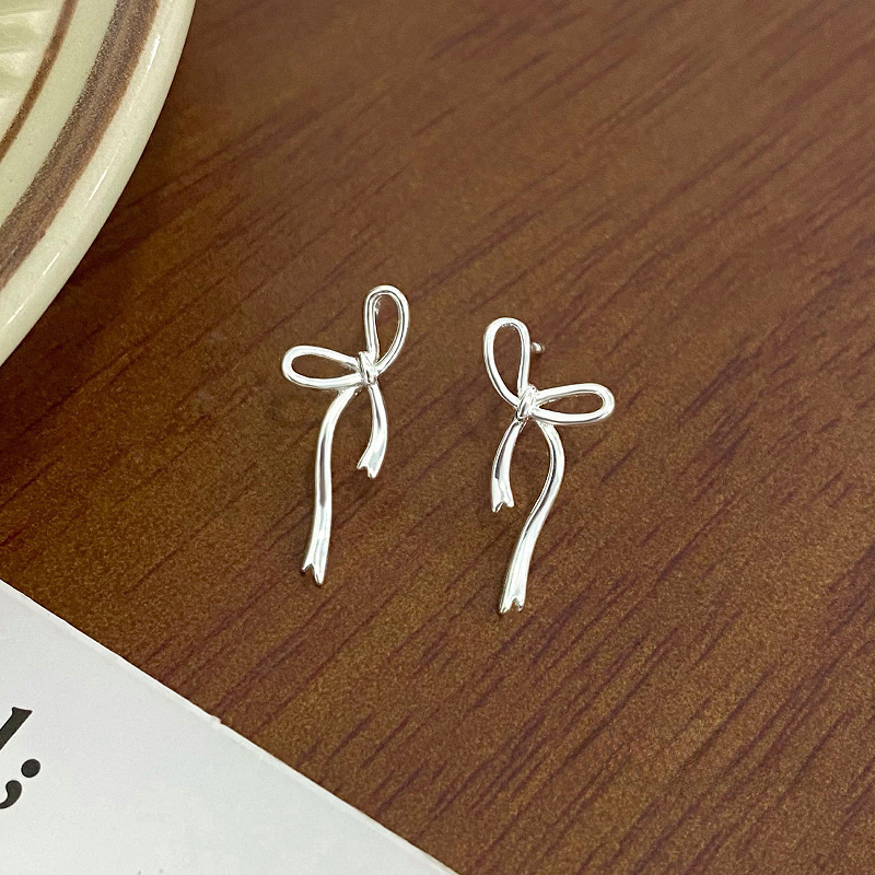 Ganjia S925 sterling silver sweet bow earrings for women niche design girly light luxury earrings and earrings drop shipping